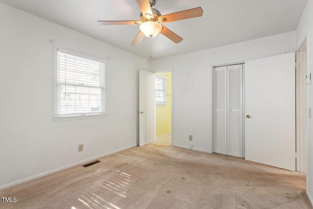 821 Northclift Dr, Raleigh, NC 27609 - unfurnished bedroom featuring carpet floors, a closet, and ceiling fan