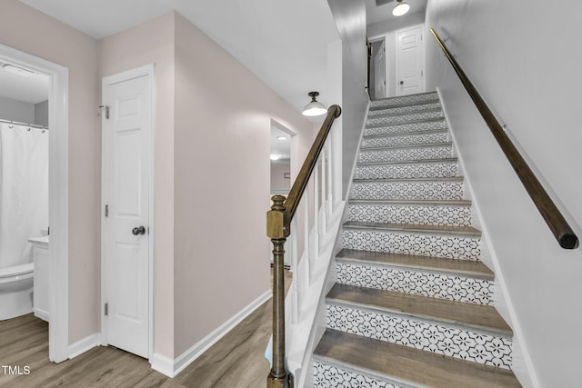 2233 Alpine Rd, Durham, NC 27707 - stairway featuring wood finished floors and baseboards