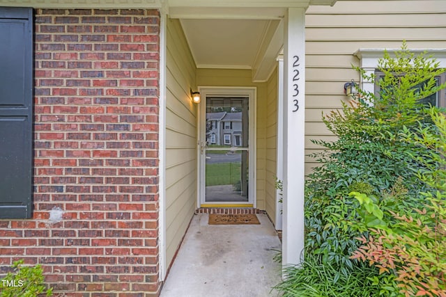 2233 Alpine Rd, Durham, NC 27707 - property entrance featuring brick siding