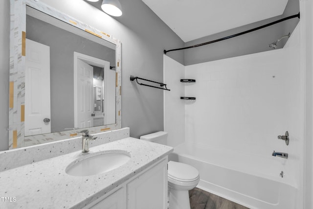 2233 Alpine Rd, Durham, NC 27707 - bathroom with vanity, shower / washtub combination, and wood finished floors