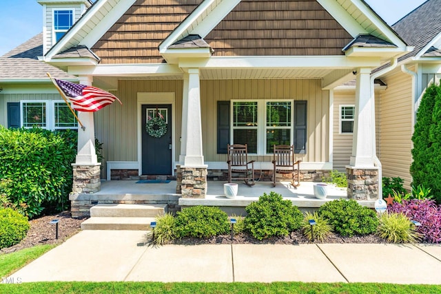 20 Kola Nut, Smithfield, NC 27577 - view of exterior entry with a porch and roof with shingles