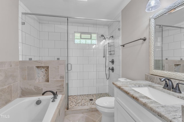 1316 Foxrun Dr, Raleigh, NC 27610 - full bath with vanity, a shower stall, a bath, and tile patterned flooring
