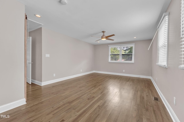 1316 Foxrun Dr, Raleigh, NC 27610 - unfurnished room with ceiling fan, wood finished floors, a smoke detector, and recessed lighting