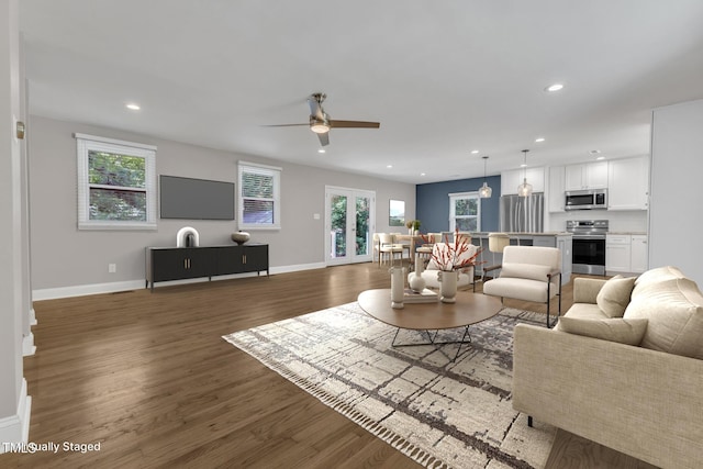 1316 Foxrun Dr, Raleigh, NC 27610 - living area with a ceiling fan, wood finished floors, and recessed lighting