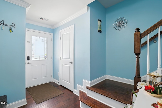 651 Berry Chase Way, Cary, NC 27519 - foyer with wood finished floors, stairs, and crown molding