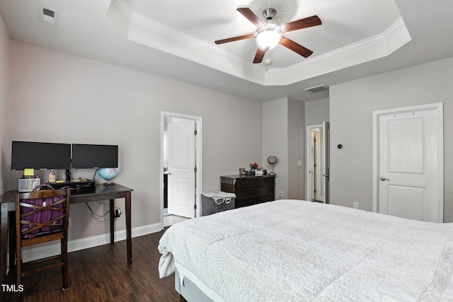 651 Berry Chase Way, Cary, NC 27519 - bedroom with a raised ceiling, dark wood-type flooring, ornamental molding, a desk, and ceiling fan