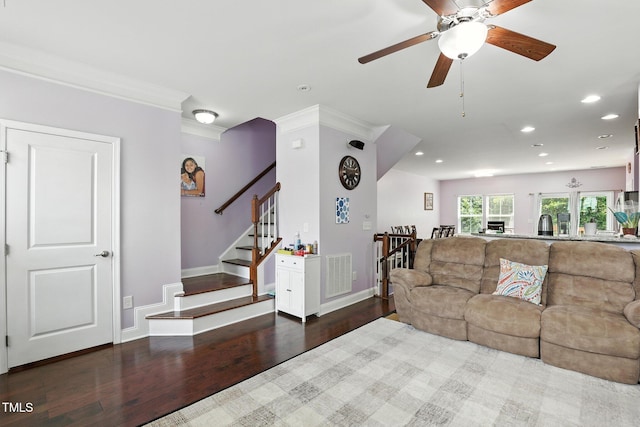 651 Berry Chase Way, Cary, NC 27519 - living area with recessed lighting, wood finished floors, ceiling fan, ornamental molding, and stairway