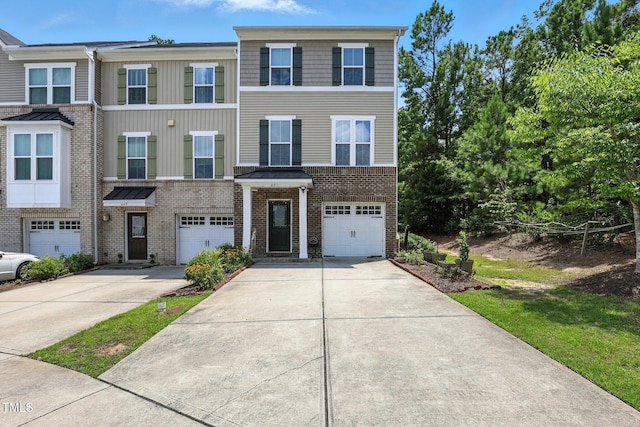 651 Berry Chase Way, Cary, NC 27519 - view of property with driveway, brick siding, and an attached garage