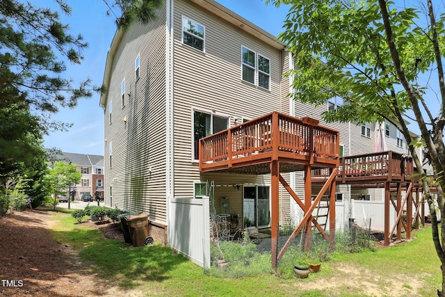 651 Berry Chase Way, Cary, NC 27519 - back of property with a wooden deck and stairs
