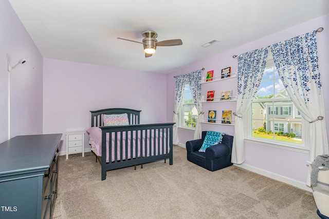 4611 Lazy Hollow Dr, Knightdale, NC 27545 - bedroom featuring light colored carpet and a ceiling fan