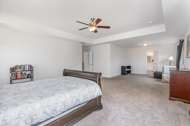4611 Lazy Hollow Dr, Knightdale, NC 27545 - bedroom featuring a raised ceiling, light colored carpet, and ceiling fan