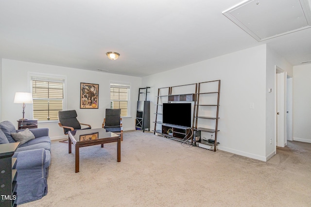 4611 Lazy Hollow Dr, Knightdale, NC 27545 - carpeted living area with attic access and baseboards