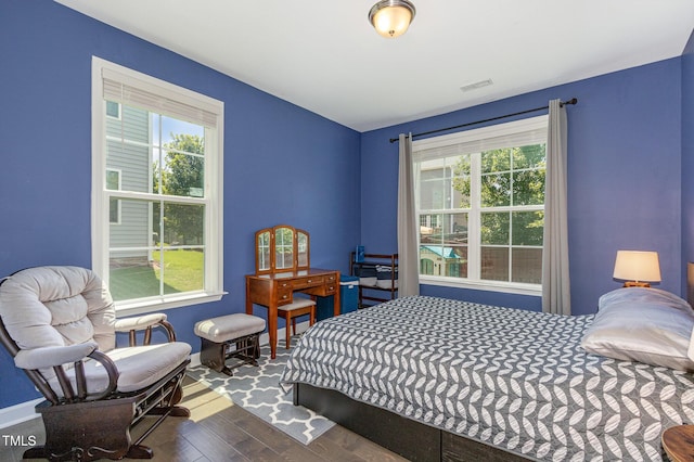 4611 Lazy Hollow Dr, Knightdale, NC 27545 - bedroom with multiple windows and wood finished floors