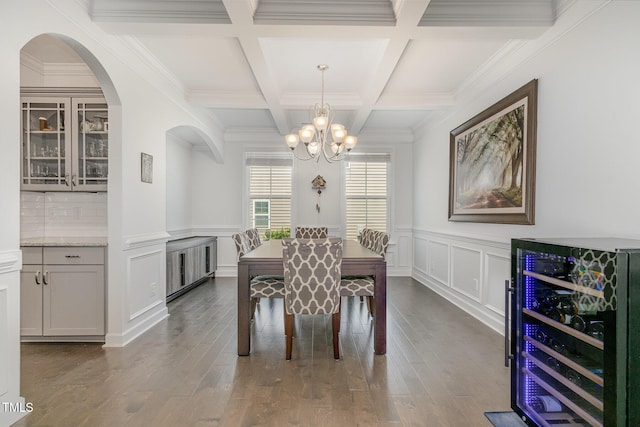 4611 Lazy Hollow Dr, Knightdale, NC 27545 - dining room with wine cooler, a chandelier, coffered ceiling, beam ceiling, and dark wood-style flooring