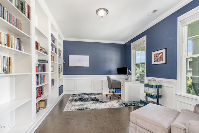 4611 Lazy Hollow Dr, Knightdale, NC 27545 - home office featuring dark wood-type flooring, ornamental molding, wainscoting, a decorative wall, and built in shelves