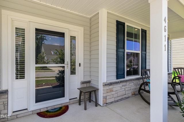 4611 Lazy Hollow Dr, Knightdale, NC 27545 - property entrance with covered porch and stone siding