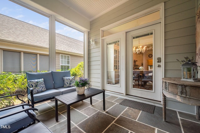501 Tranquil Sound Dr, Cary, NC 27519 - sunroom with outdoor lounge area and a chandelier