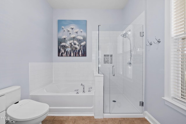 501 Tranquil Sound Dr, Cary, NC 27519 - bathroom featuring a bath, a shower stall, and tile patterned flooring