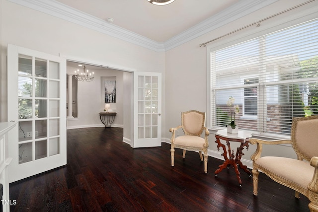 501 Tranquil Sound Dr, Cary, NC 27519 - living area featuring a chandelier, wood finished floors, crown molding, and french doors