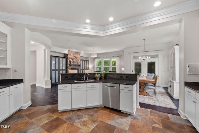 501 Tranquil Sound Dr, Cary, NC 27519 - kitchen featuring dishwasher, dark countertops, ornamental molding, a chandelier, and stone tile floors