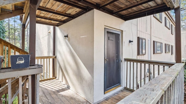 550 Pine Ridge Pl, Raleigh, NC 27609 - doorway to property featuring stucco siding