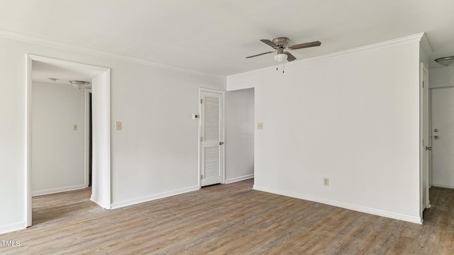 550 Pine Ridge Pl, Raleigh, NC 27609 - unfurnished room with ceiling fan, crown molding, and wood finished floors