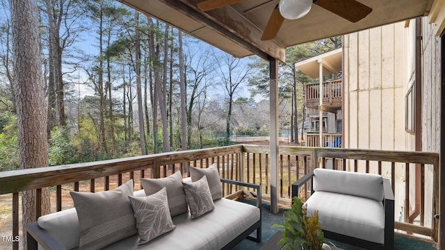 550 Pine Ridge Pl, Raleigh, NC 27609 - deck featuring a ceiling fan and an outdoor living space