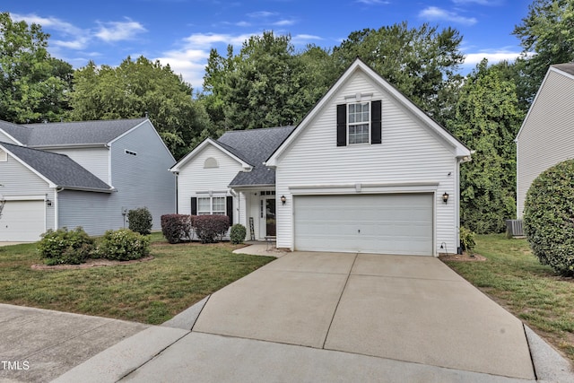 5513 Enoree Ln, Raleigh, NC 27616 - traditional home with a front yard, concrete driveway, and an attached garage