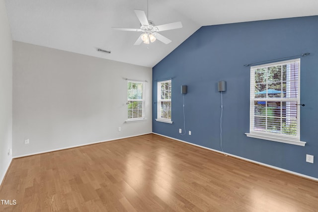 5513 Enoree Ln, Raleigh, NC 27616 - spare room featuring ceiling fan, plenty of natural light, wood finished floors, and high vaulted ceiling