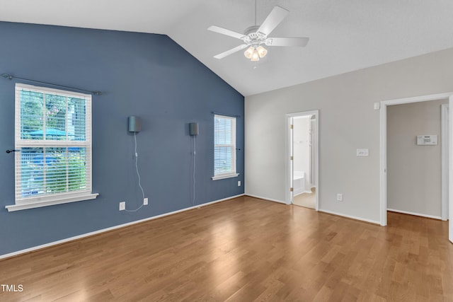 5513 Enoree Ln, Raleigh, NC 27616 - unfurnished bedroom with high vaulted ceiling, wood finished floors, a ceiling fan, and ensuite bathroom