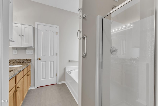 5513 Enoree Ln, Raleigh, NC 27616 - full bathroom with a stall shower, a garden tub, and vanity