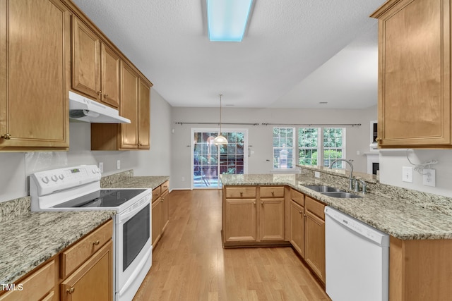 5513 Enoree Ln, Raleigh, NC 27616 - kitchen with white appliances, under cabinet range hood, light wood-type flooring, and light stone countertops