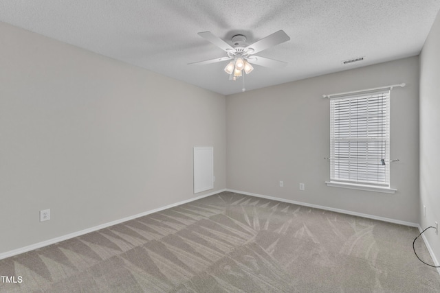 5513 Enoree Ln, Raleigh, NC 27616 - carpeted empty room featuring ceiling fan and a textured ceiling