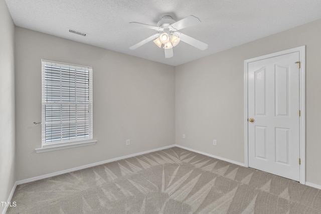 5513 Enoree Ln, Raleigh, NC 27616 - spare room featuring light colored carpet and ceiling fan