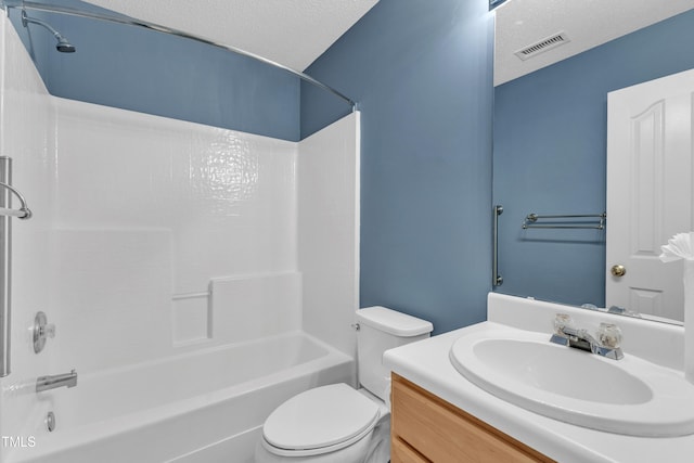 5513 Enoree Ln, Raleigh, NC 27616 - full bathroom featuring washtub / shower combination, vanity, and a textured ceiling