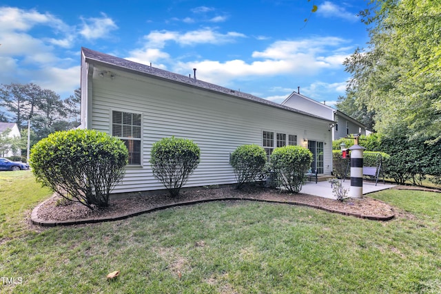 5513 Enoree Ln, Raleigh, NC 27616 - rear view of property with a patio area and a yard