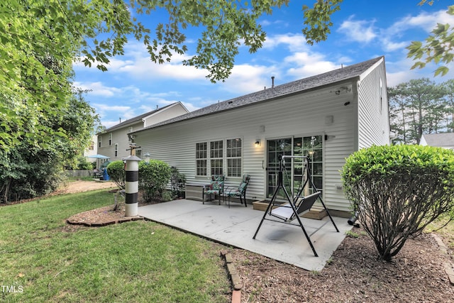 5513 Enoree Ln, Raleigh, NC 27616 - rear view of property featuring a yard and a patio