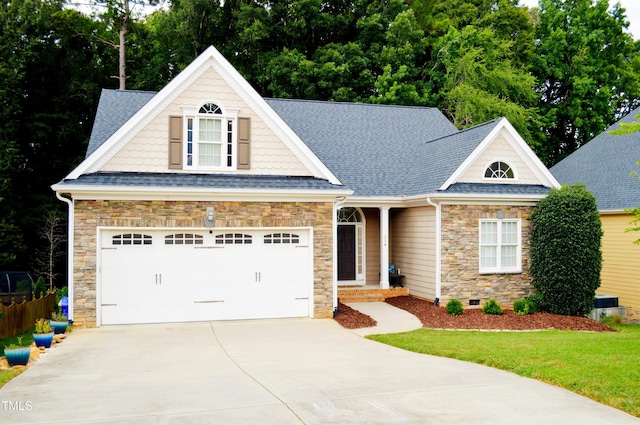 114 Bridle Path, Pittsboro, NC 27312 - craftsman inspired home with stone siding, driveway, a shingled roof, and crawl space