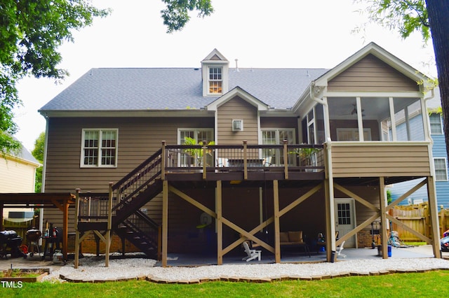 114 Bridle Path, Pittsboro, NC 27312 - back of property with a patio area, a sunroom, and a wooden deck
