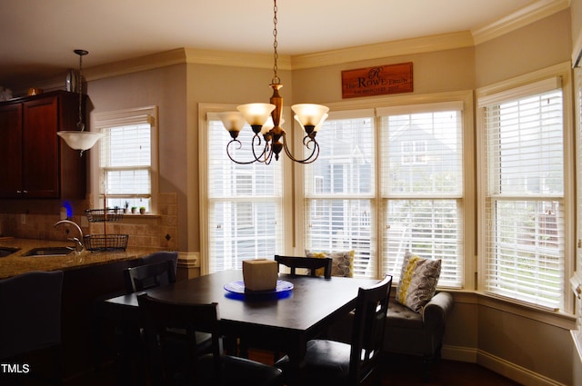 114 Bridle Path, Pittsboro, NC 27312 - dining space featuring a chandelier and crown molding