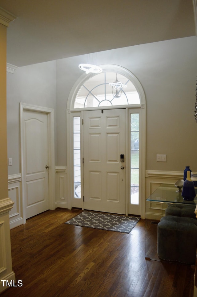 114 Bridle Path, Pittsboro, NC 27312 - foyer featuring a decorative wall, wood finished floors, and wainscoting