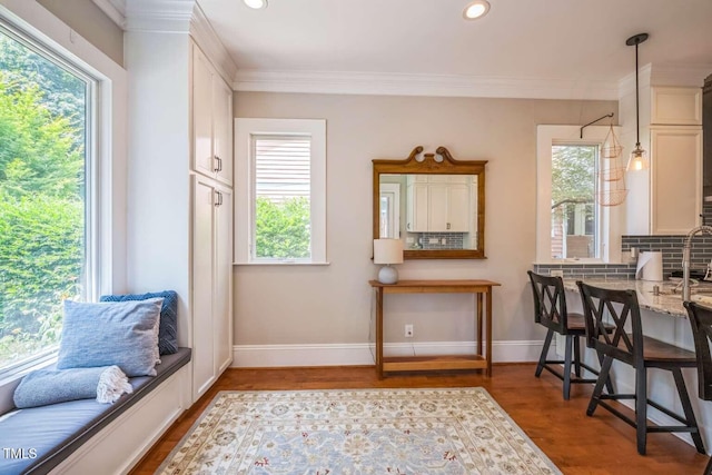 1213 Pierce St, Raleigh, NC 27605 - dining area featuring wood finished floors, recessed lighting, and ornamental molding