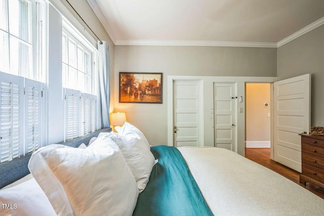 1213 Pierce St, Raleigh, NC 27605 - bedroom with crown molding and wood finished floors