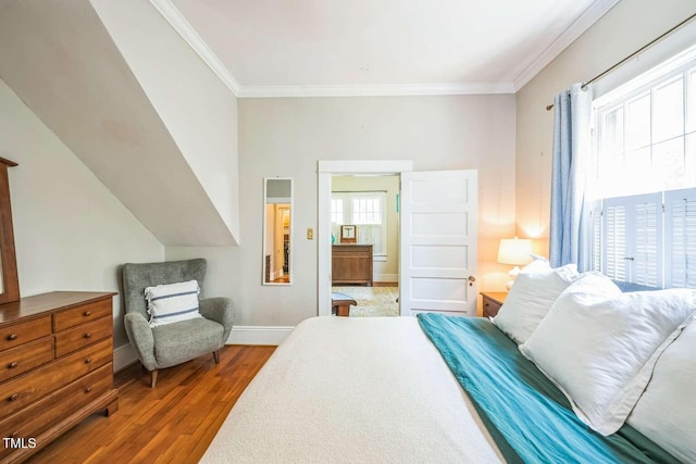 1213 Pierce St, Raleigh, NC 27605 - bedroom featuring wood finished floors and crown molding