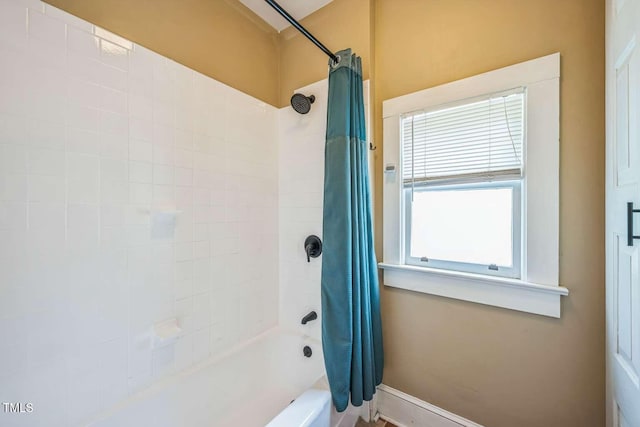 1213 Pierce St, Raleigh, NC 27605 - bathroom with shower / bath combination with curtain and baseboards