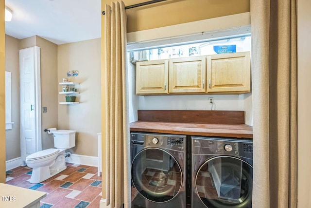 1213 Pierce St, Raleigh, NC 27605 - laundry area featuring independent washer and dryer and cabinet space
