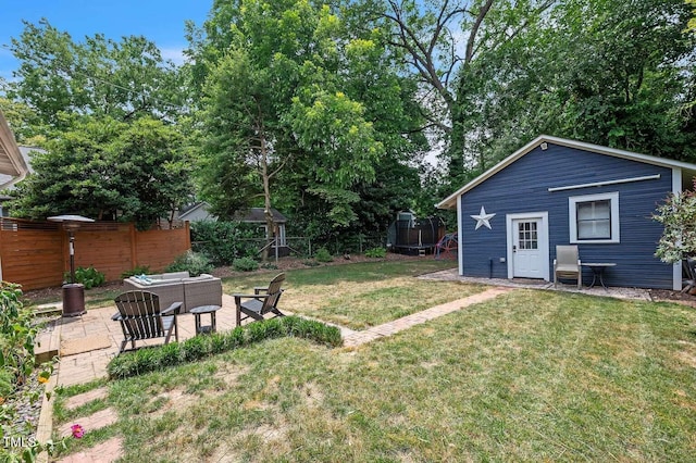 1213 Pierce St, Raleigh, NC 27605 - fenced yard featuring a patio area and an outdoor hangout area