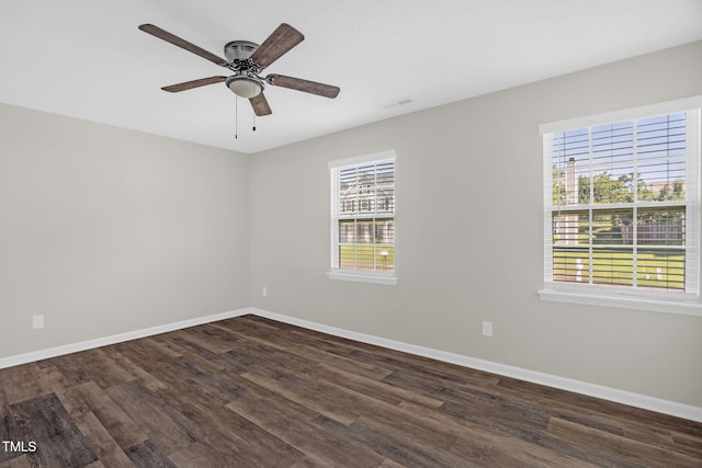 1814 Shiva Ct, Durham, NC 27703 - spare room featuring dark wood finished floors and ceiling fan