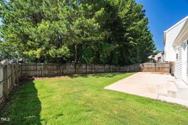1814 Shiva Ct, Durham, NC 27703 - fenced backyard featuring a patio area