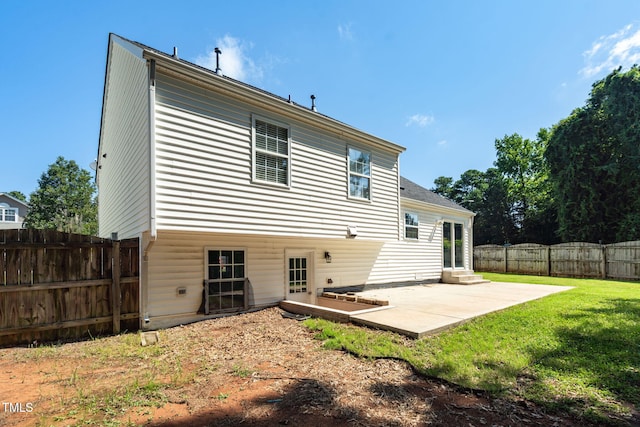 1814 Shiva Ct, Durham, NC 27703 - rear view of house with a patio area and entry steps
